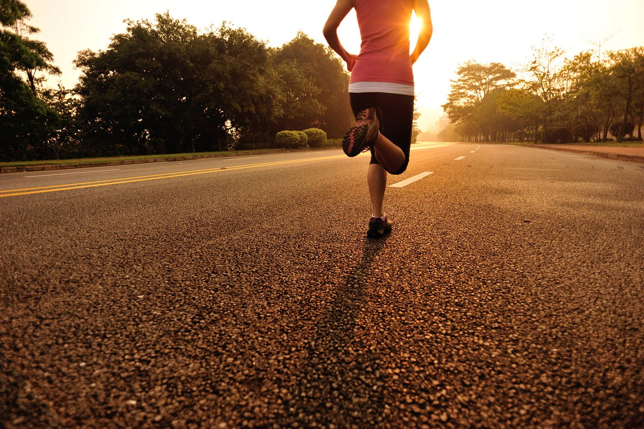 Woman jogging on road